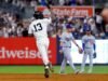 Jazz Chisholm Jr. 8th-এ গেম-টাইয়িং হোমার হিট করে এবং Yankees ডজার্সকে 2-1 থেকে পরাজিত করে ডাবলহেডারকে বিভক্ত করে